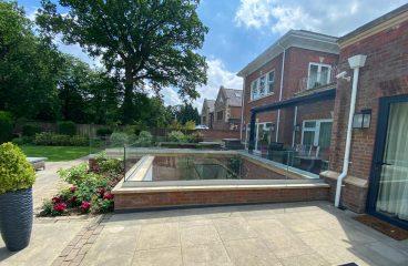 Glass balustrade newly installed in garden